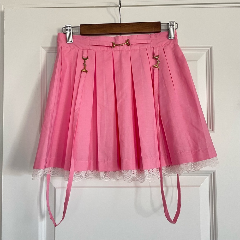 Pink Pleated Mini Skirt with Lace Detail and Attached Suspender Straps